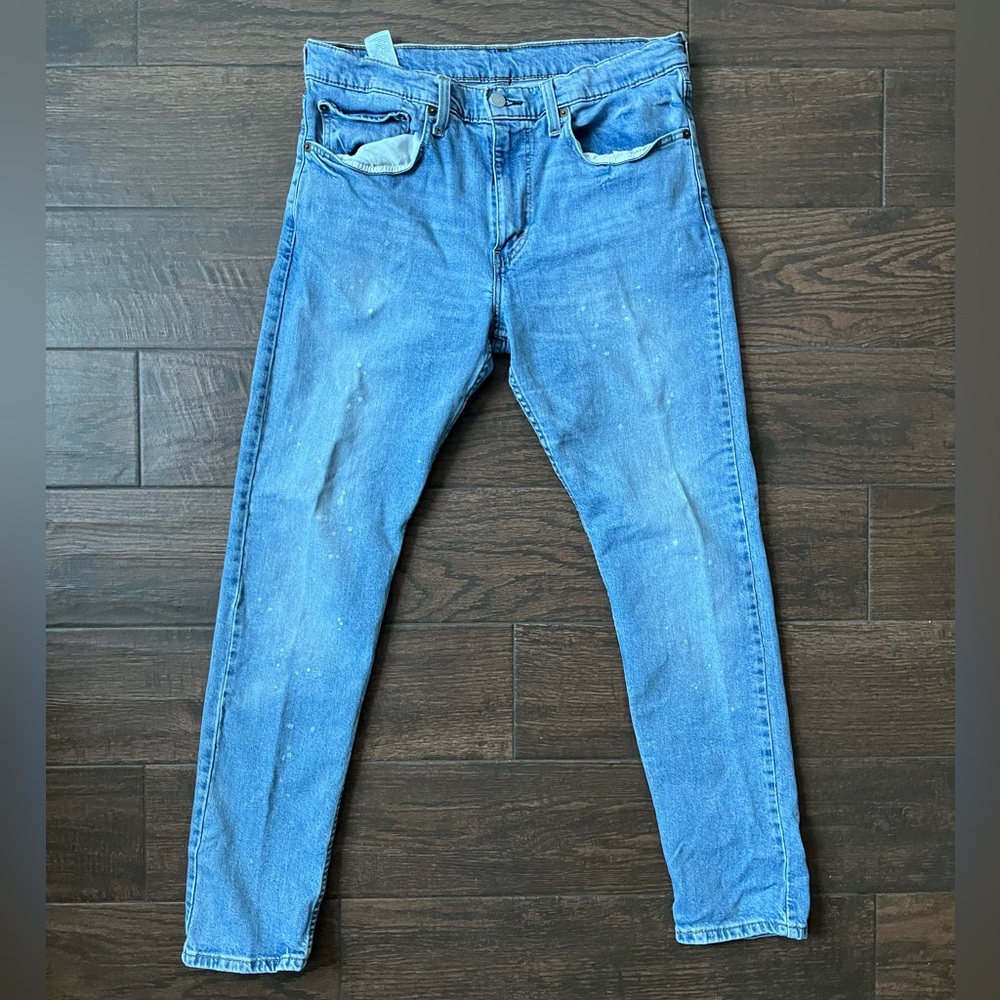 Levi’s bleach faded washed light blue jeans